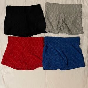 Set of Four Textured Shorts in Black, Gray, Red, and Blue